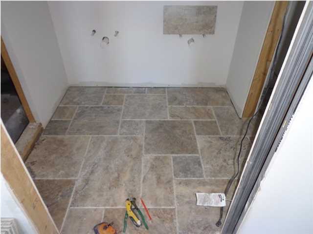 69 Lifeguard Loop East Inlet Beach, FL 32461 - Photo 19 of 26 a bathroom with a sink and glass door