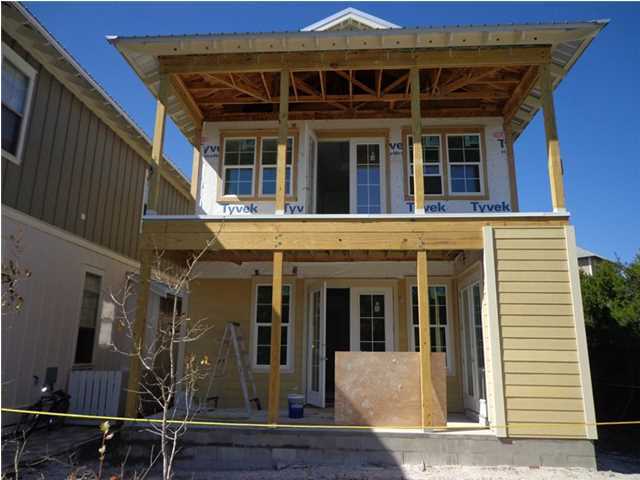 69 Lifeguard Loop East Inlet Beach, FL 32461 - Photo 3 of 26 a view of a house with wooden deck