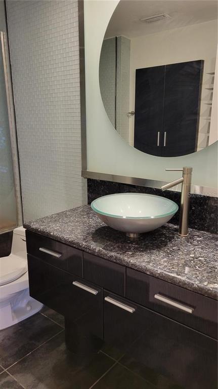 5168 Northridge Road, Unit 106 Sarasota, FL 34238 - Photo 11 of 33 a living room with stainless steel appliances