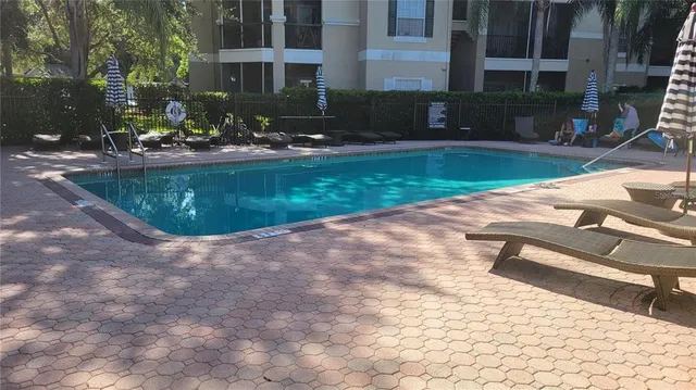 a view of a house with swimming pool