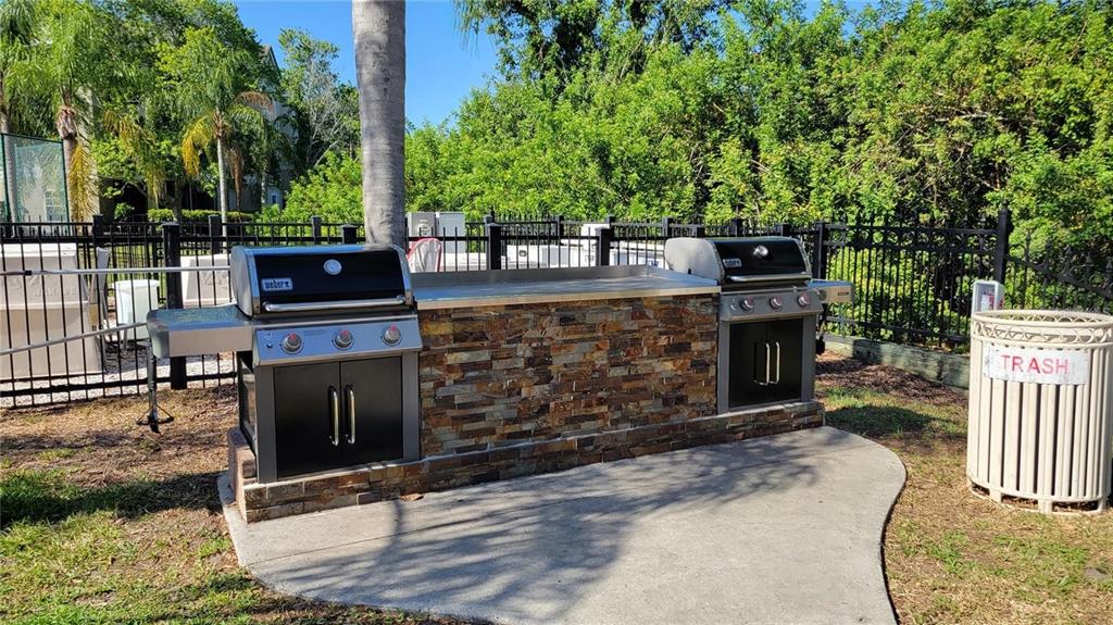 5168 Northridge Road, Unit 106 Sarasota, FL 34238 - Photo 29 of 33 a outdoor space with lots of trees