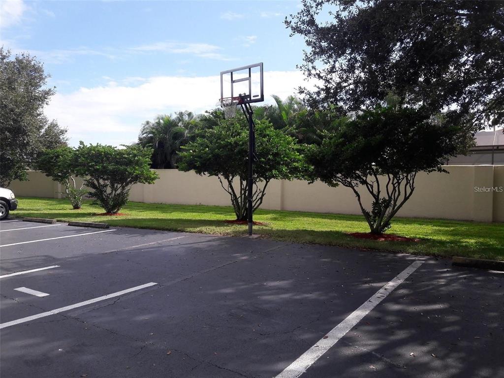 5168 Northridge Road, Unit 106 Sarasota, FL 34238 - Photo 32 of 33 a view of a yard with a house