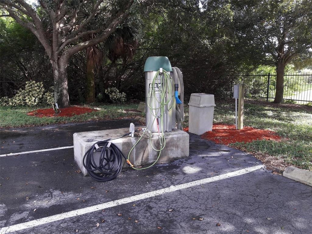 5168 Northridge Road, Unit 106 Sarasota, FL 34238 - Photo 33 of 33 a view of a fire pit with iron fence