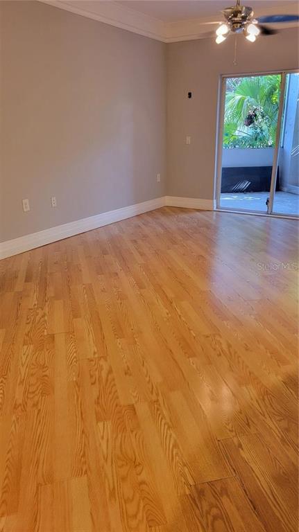 5168 Northridge Road, Unit 106 Sarasota, FL 34238 - Photo 7 of 33 a view of an empty room with a window