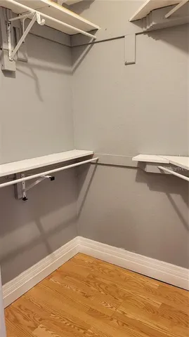 a view of a room with racks on the wall