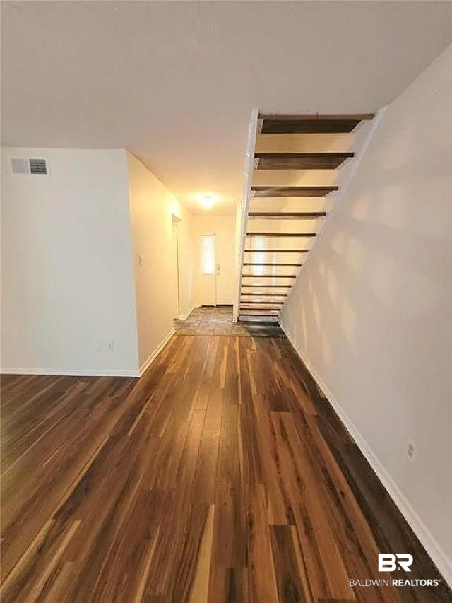 6701 Dickens Ferry Road, Unit 53 Mobile, AL 36608 - Photo 10 of 23 Interior space featuring wood finished floors and baseboards