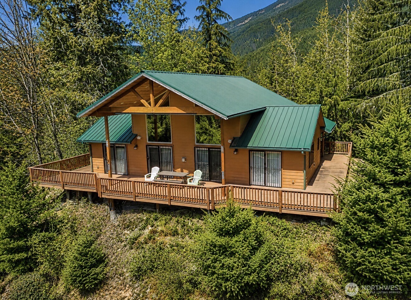 0 Boyd Road Randle, WA 98377 - Photo 2 of 39 aerial view of a house with wooden deck and furniture