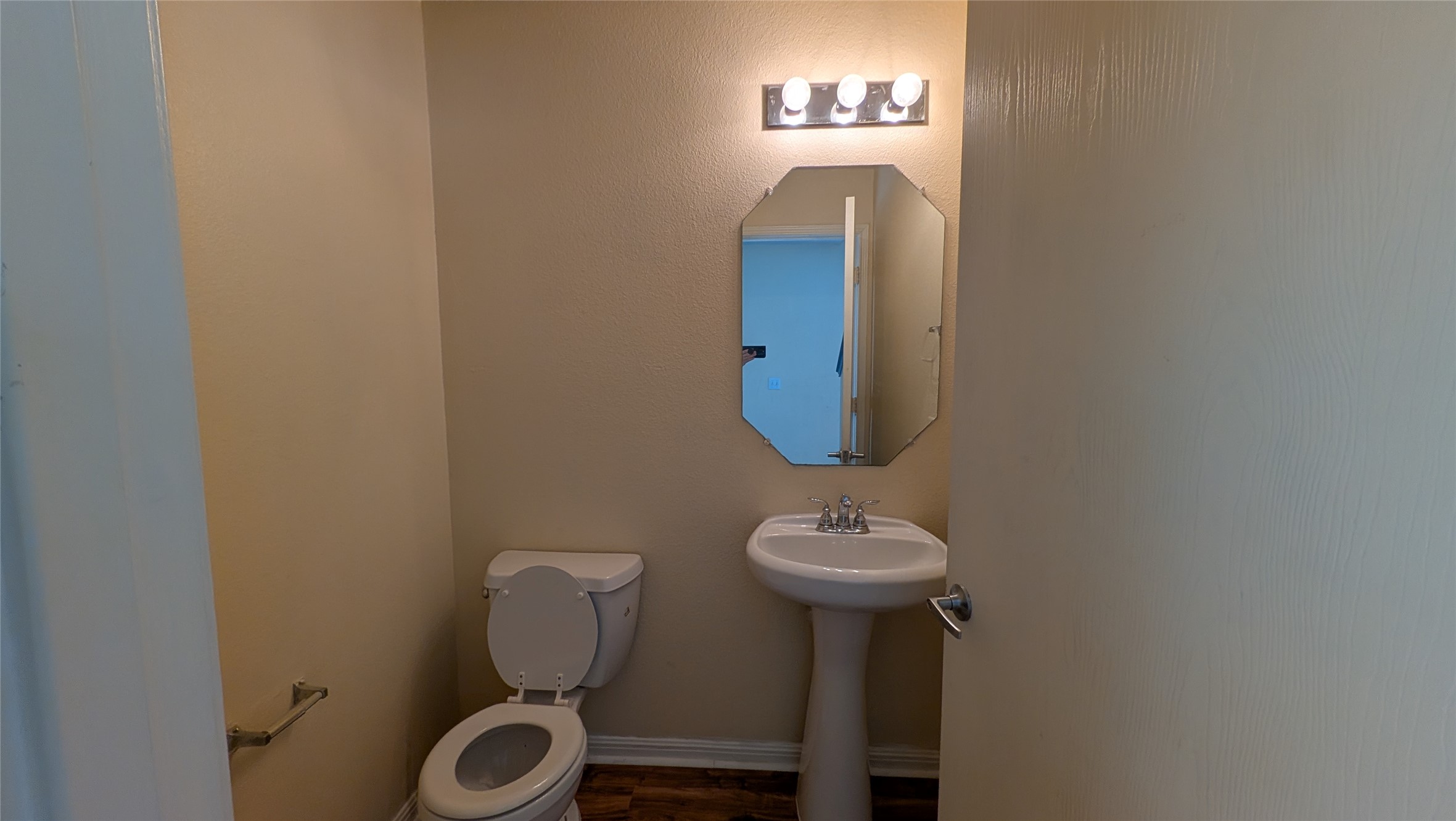 8525 Chick Pea Lane Austin, TX 78745 - Photo 8 of 22 Half bathroom with toilet and baseboards