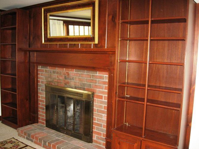 45 Boreen Road Eastham, MA 02642 - Photo 3 of 22 a hallway with a fireplace