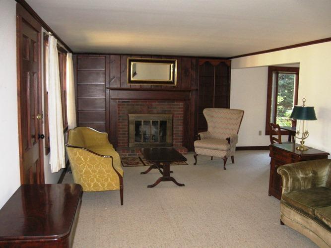 45 Boreen Road Eastham, MA 02642 - Photo 10 of 22 a living room with furniture and a fireplace