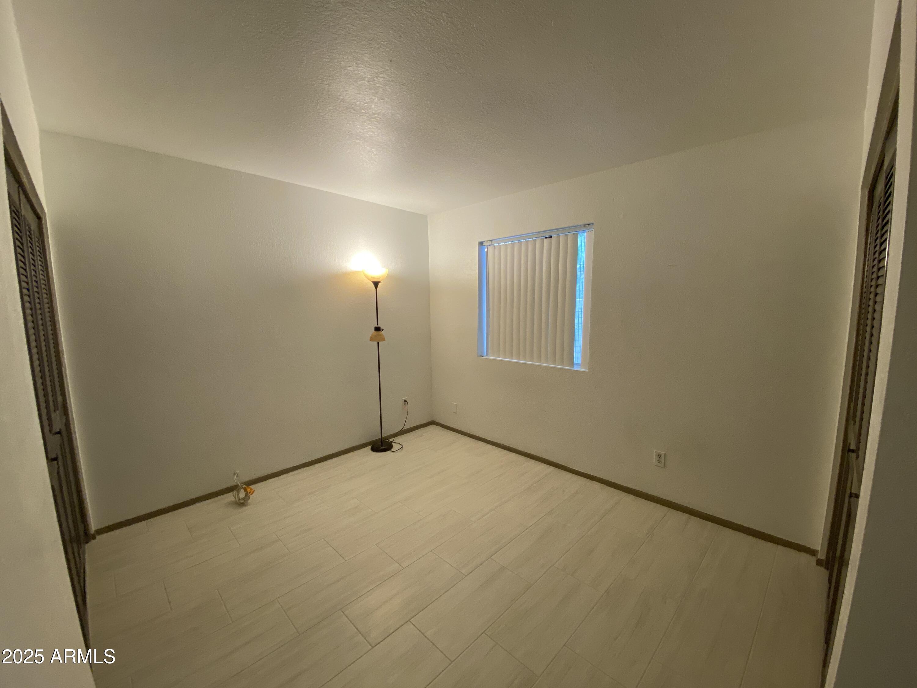 416 West Pebble Beach Drive Tempe, AZ 85282 - Photo 6 of 7 a view of an empty room