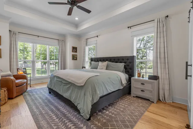 a livingroom with workspace and a couch