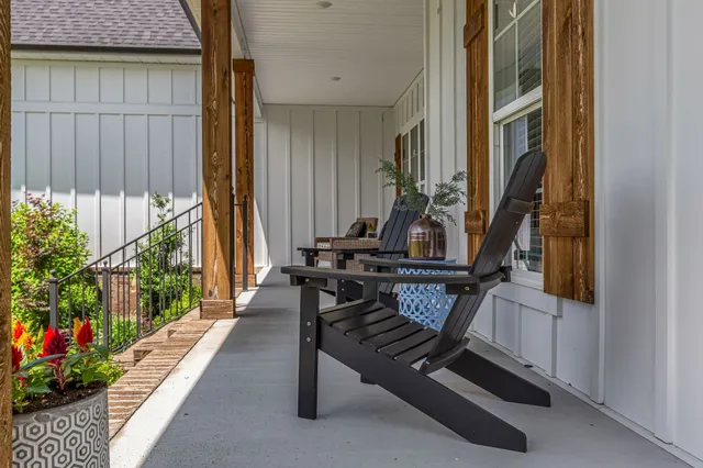 a view of living room with furniture and natural light