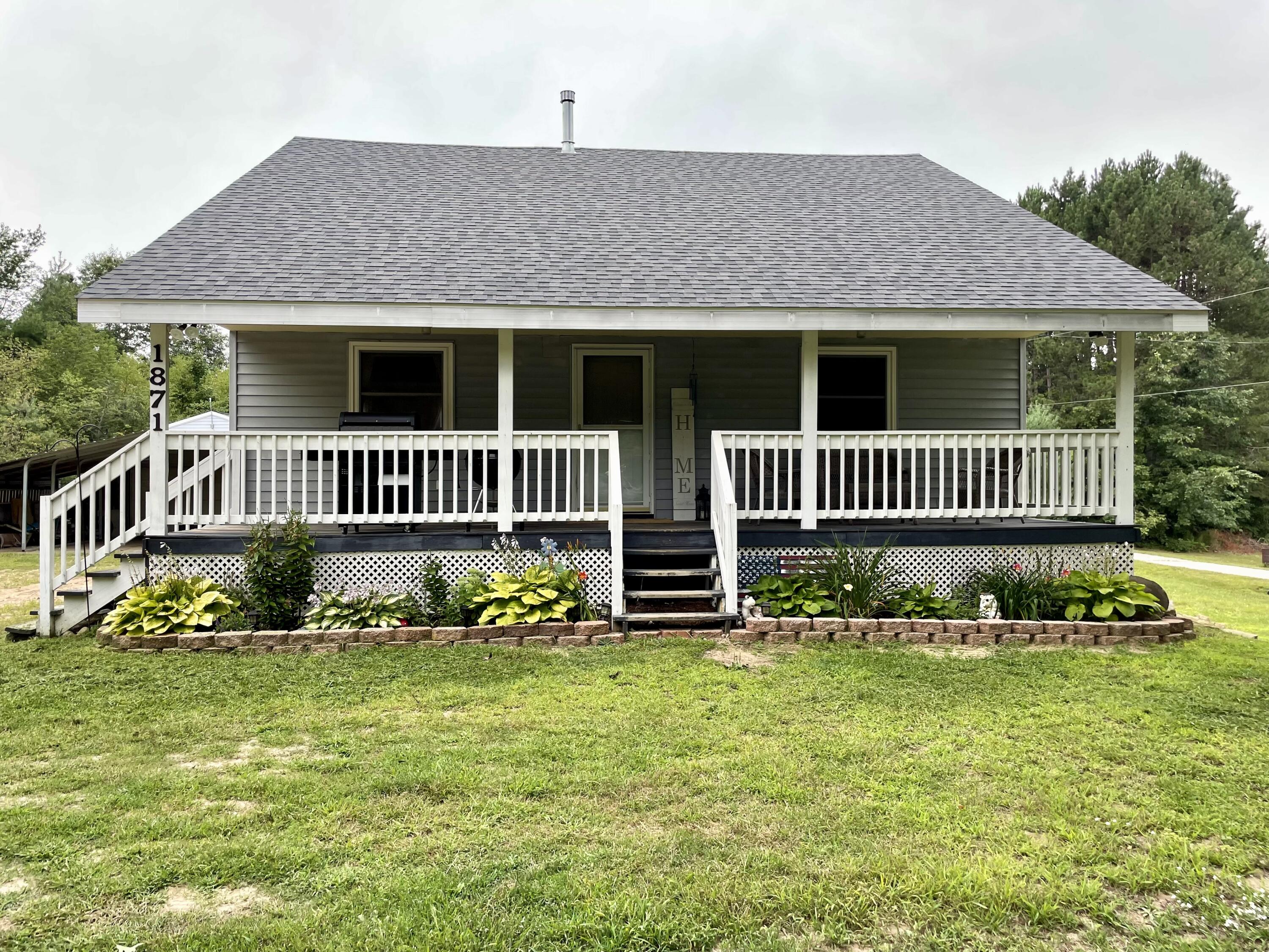 1871 North Littlefield Road Weidman, MI 48893 - Photo 1 of 22 #1 Front of Home