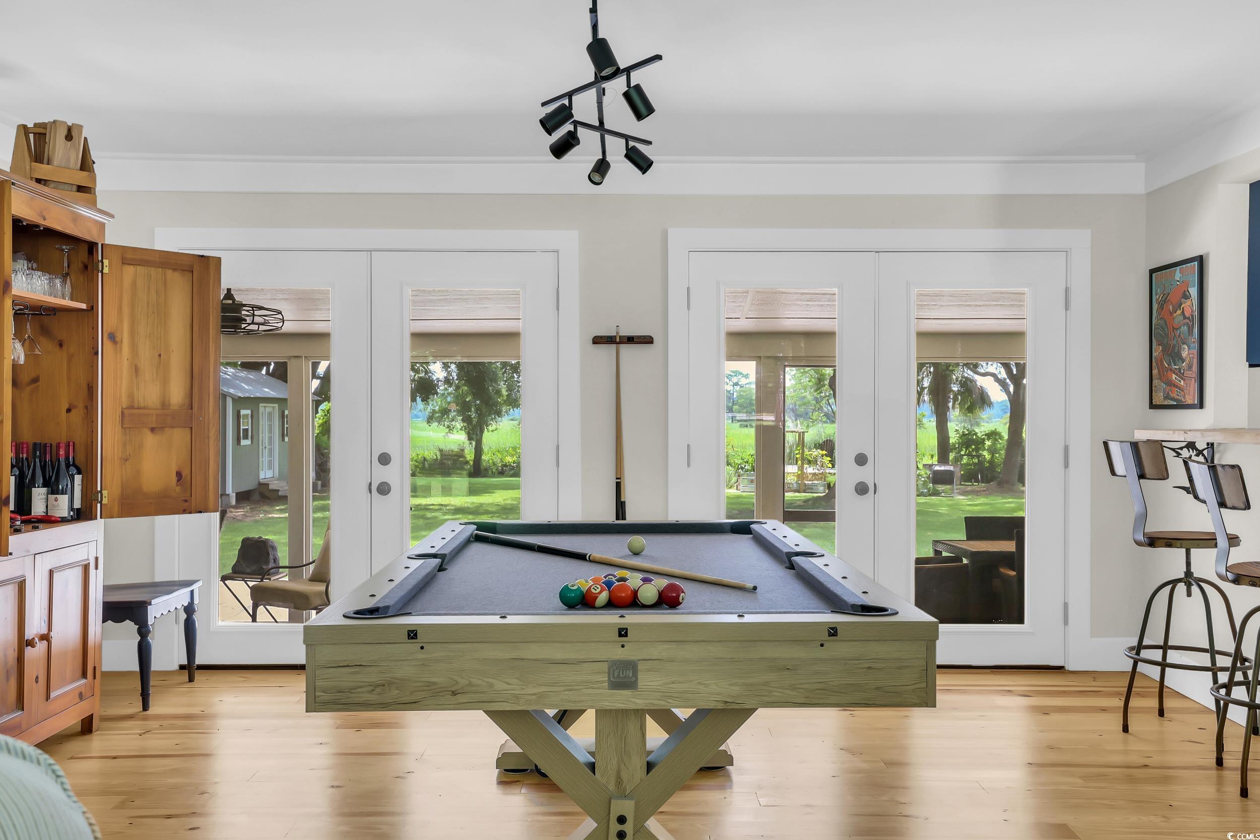 485 County Rd S-22-592 Georgetown, SC 29440 - Photo 10 of 40 Rec room featuring french doors, billiards, light wood finished floors, and ornamental molding