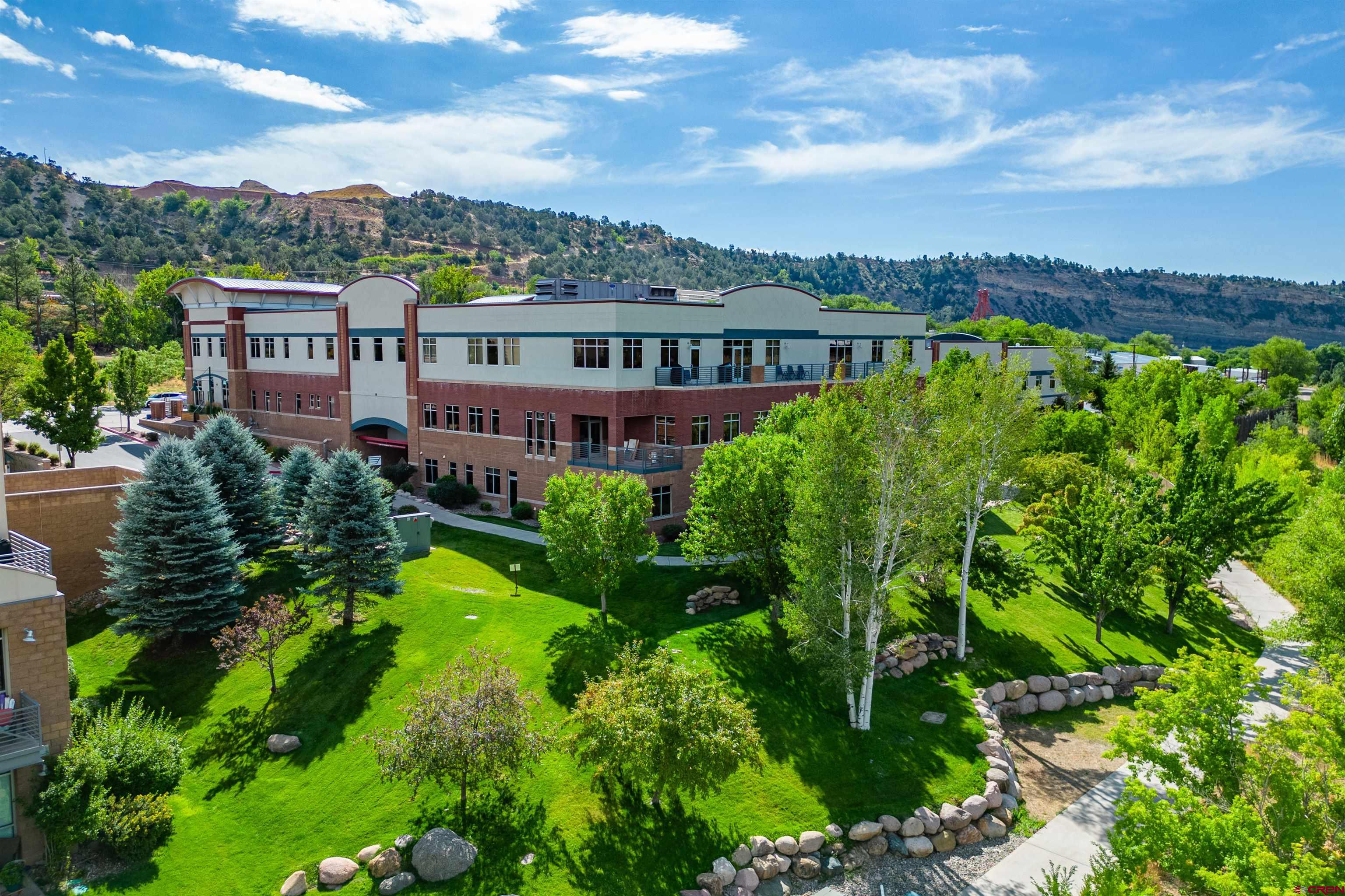 575 Rivergate Lane, Unit 208 Durango, CO 81301 - Photo 16 of 22 a view of a city with lush green space