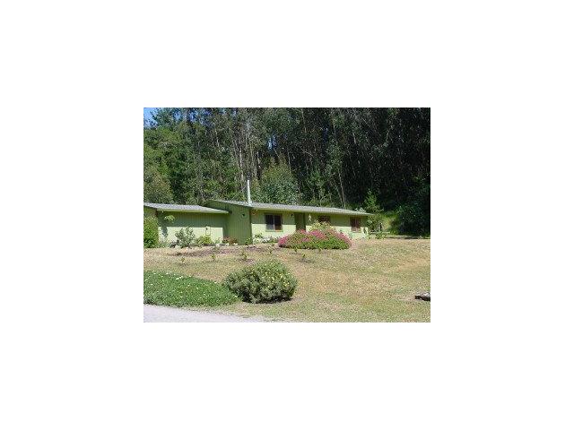 833 Lewis Road Watsonville, CA 95076 - Photo 2 of 9 a picture of a bench in front of a building