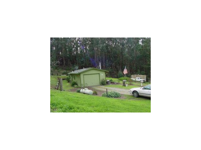 833 Lewis Road Watsonville, CA 95076 - Photo 5 of 9 a view of a house with a yard and sitting area
