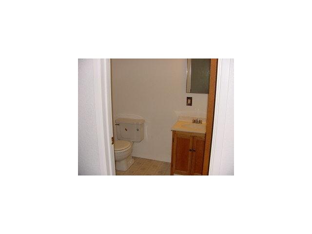 833 Lewis Road Watsonville, CA 95076 - Photo 7 of 9 a bathroom with a toilet and a sink