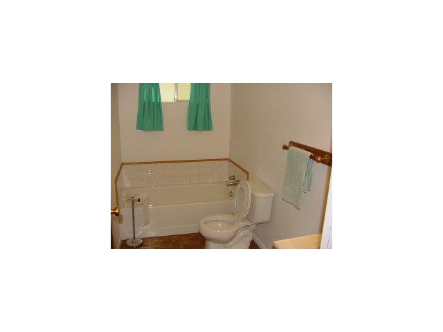 833 Lewis Road Watsonville, CA 95076 - Photo 9 of 9 a bathroom with a sink and mirror