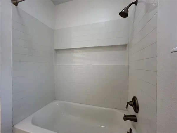a bathroom with a bathtub