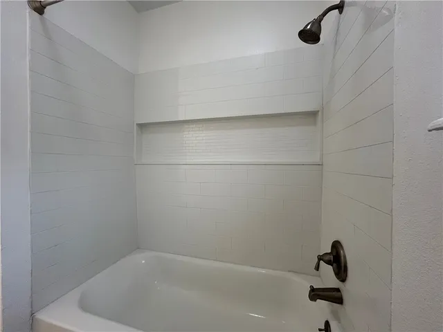 a bathroom with a bathtub