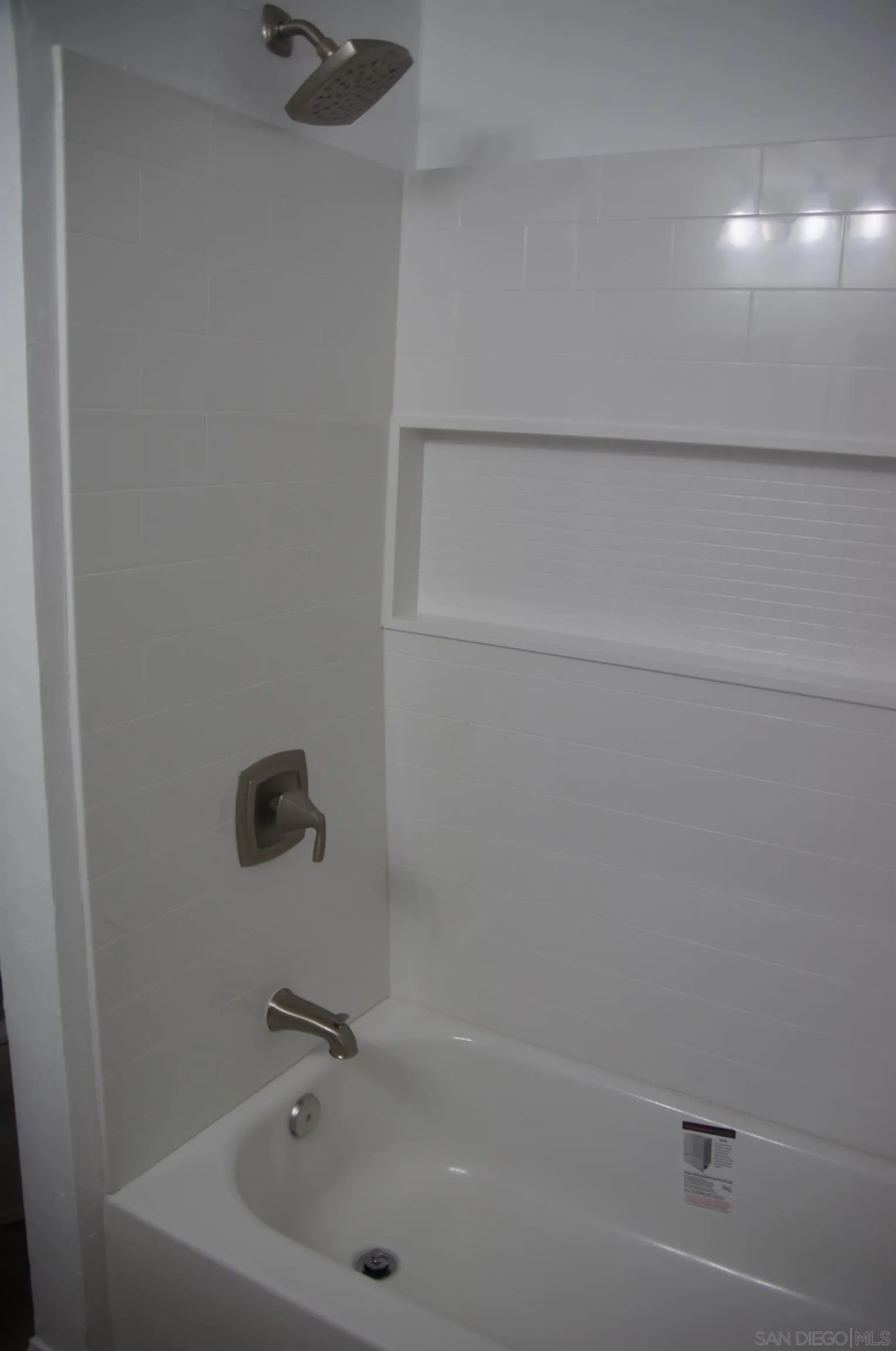 10088 Campo Road Spring Valley, CA 91977 - Photo 11 of 14 a bathroom with a tub