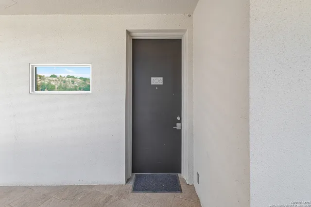 a view of elevator with hallway