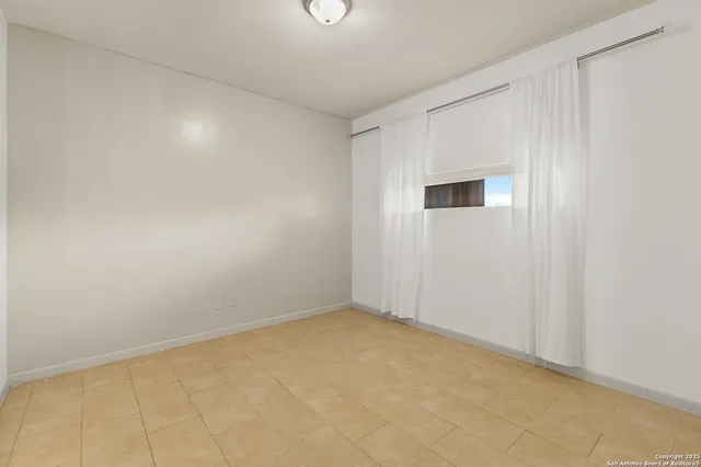 an empty room with a workbench