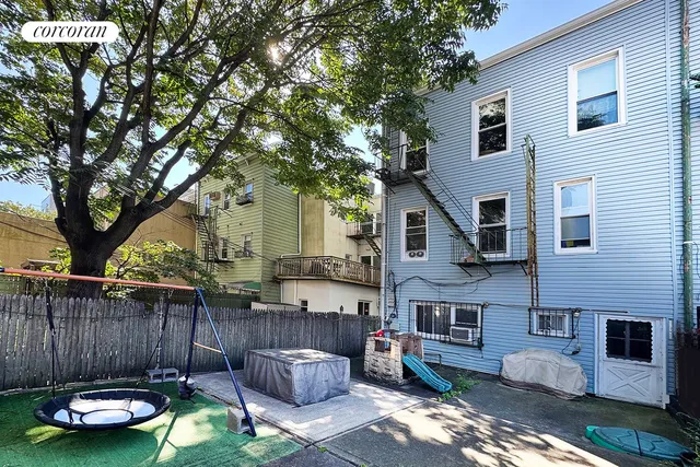 a view of a back yard of the house