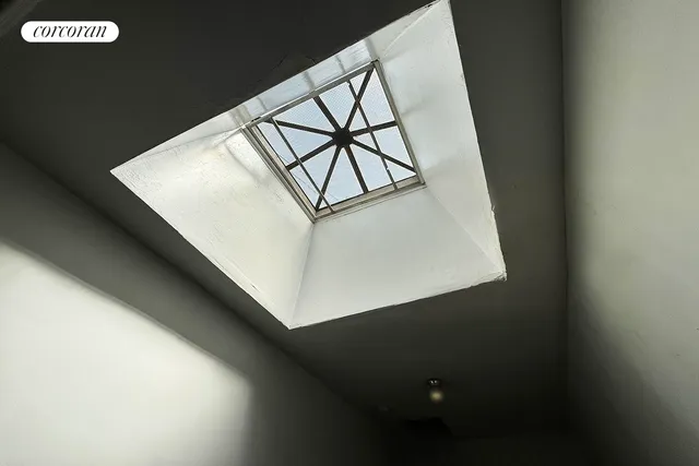 a backyard of a house with yard and outdoor seating