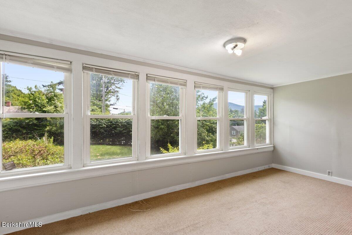 97 Barth Street North Adams, MA 01247 - Photo 18 of 31 a view of an empty room with a window