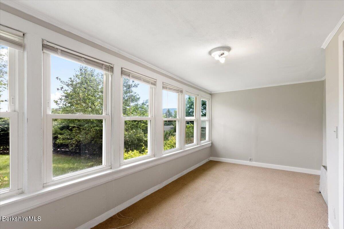 97 Barth Street North Adams, MA 01247 - Photo 19 of 31 a view of an empty room with a window