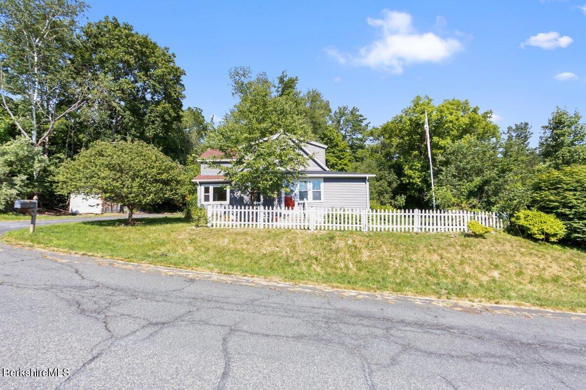 97 Barth Street North Adams, MA 01247 - Photo 3 of 31 a front view of house with yard and trees