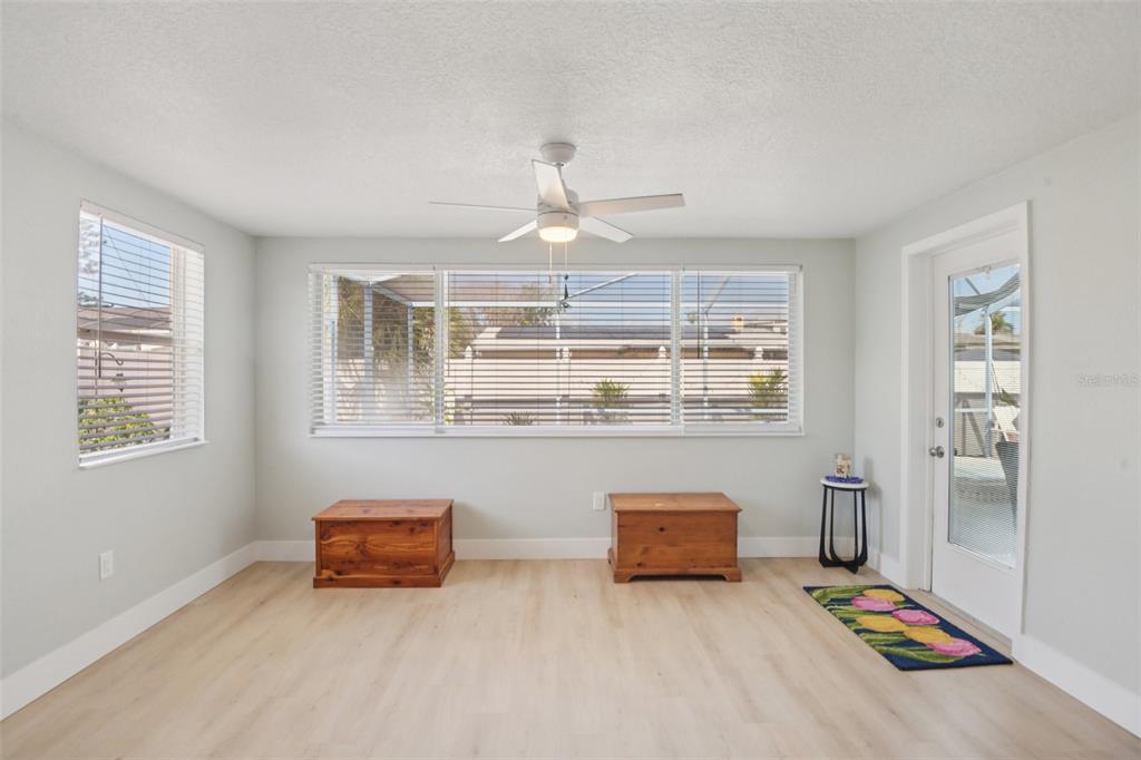 204 160th Avenue Redington Beach, FL 33708 - Photo 11 of 32 a living room with furniture and window