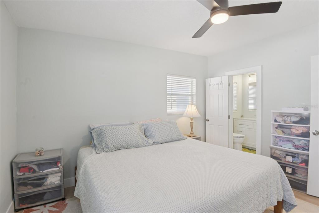 204 160th Avenue Redington Beach, FL 33708 - Photo 14 of 32 a bedroom with a bed and a cabinets