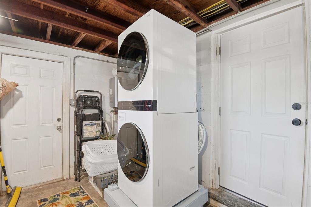 204 160th Avenue Redington Beach, FL 33708 - Photo 19 of 32 a utility room with dryer and washer