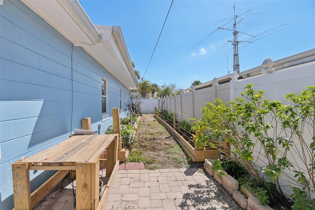 204 160th Avenue Redington Beach, FL 33708 - Photo 26 of 32 a view of a backyard with sitting area
