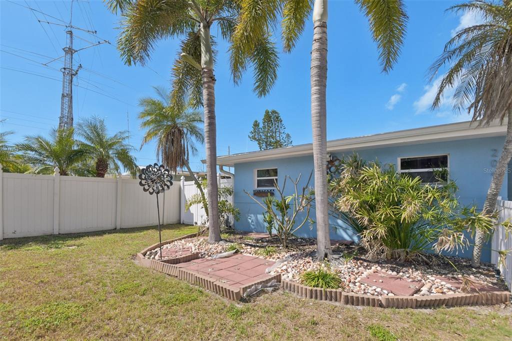 204 160th Avenue Redington Beach, FL 33708 - Photo 28 of 32 a front view of house with yard