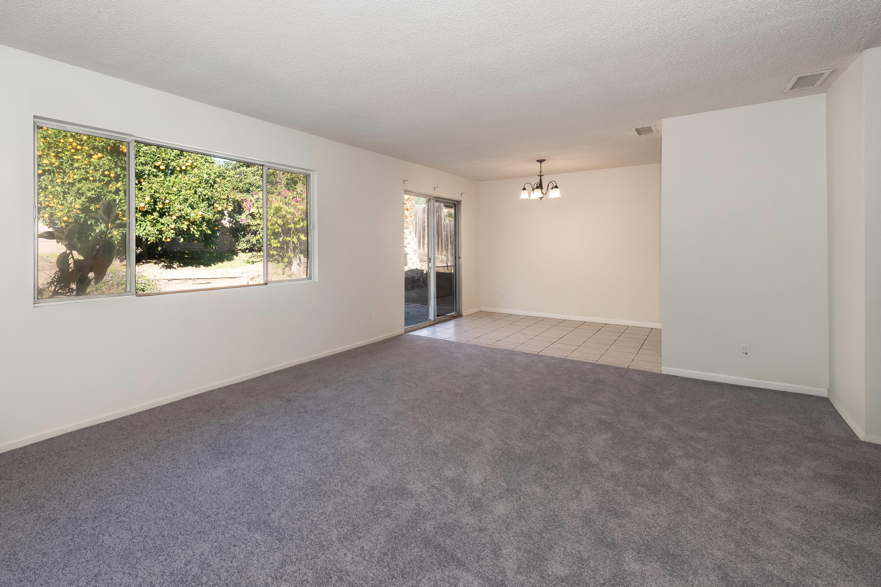 Living room looking to dining area