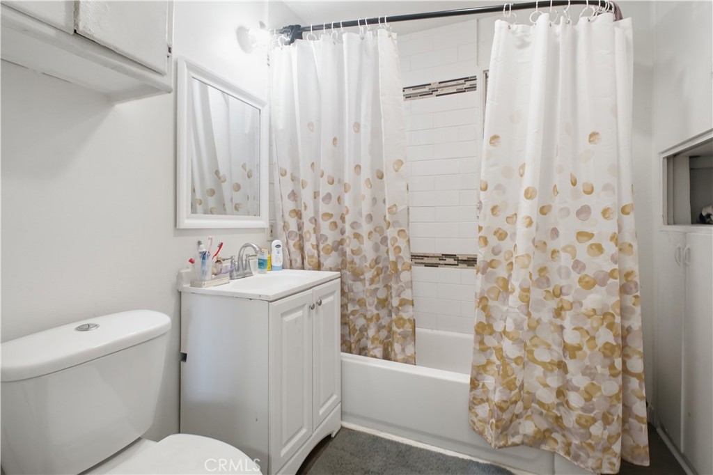 21719 Neptune Avenue Carson, CA 90745 - Photo 5 of 8 a bathroom with a sink toilet and shower