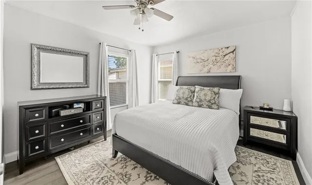 a bedroom with a bed and a dresser