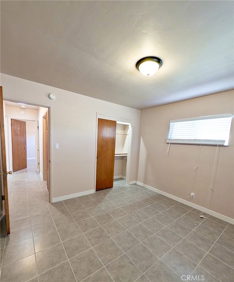 379 North 3rd Street Grover Beach, CA 93433 - Photo 15 of 24 an empty room with windows and closet