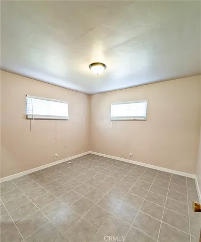 an empty room with a natural light