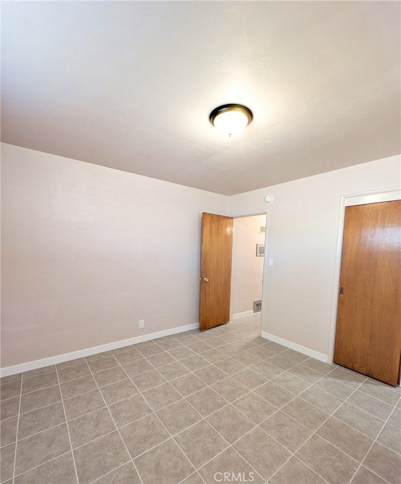 379 North 3rd Street Grover Beach, CA 93433 - Photo 17 of 24 an empty room with a natural light