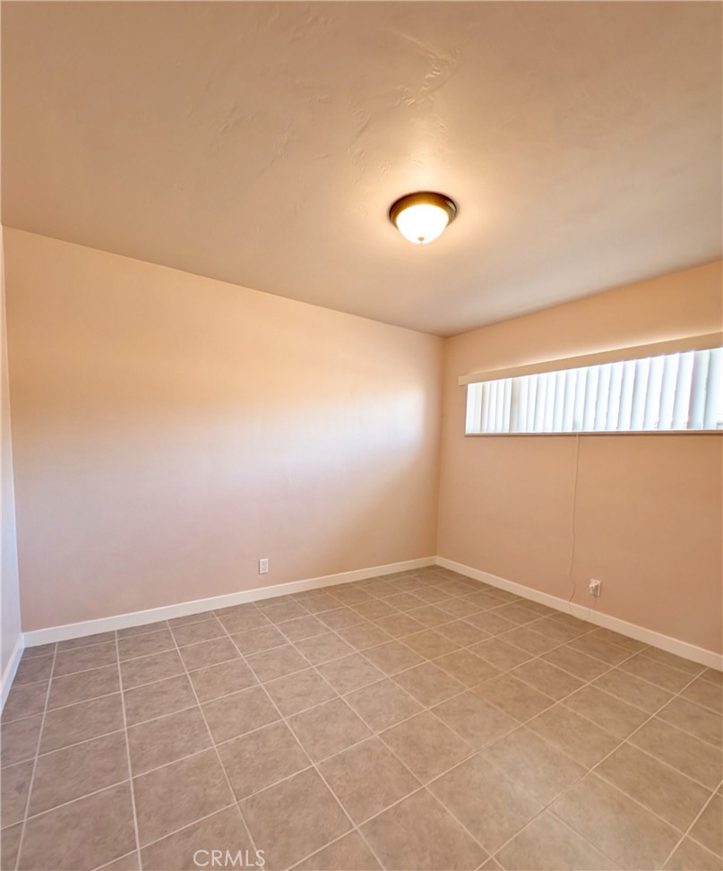 379 North 3rd Street Grover Beach, CA 93433 - Photo 20 of 24 an empty room with windows