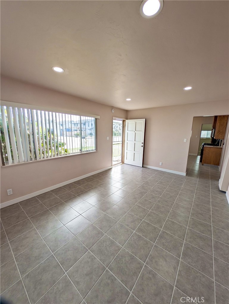 379 North 3rd Street Grover Beach, CA 93433 - Photo 2 of 24 a view of an empty room with a window