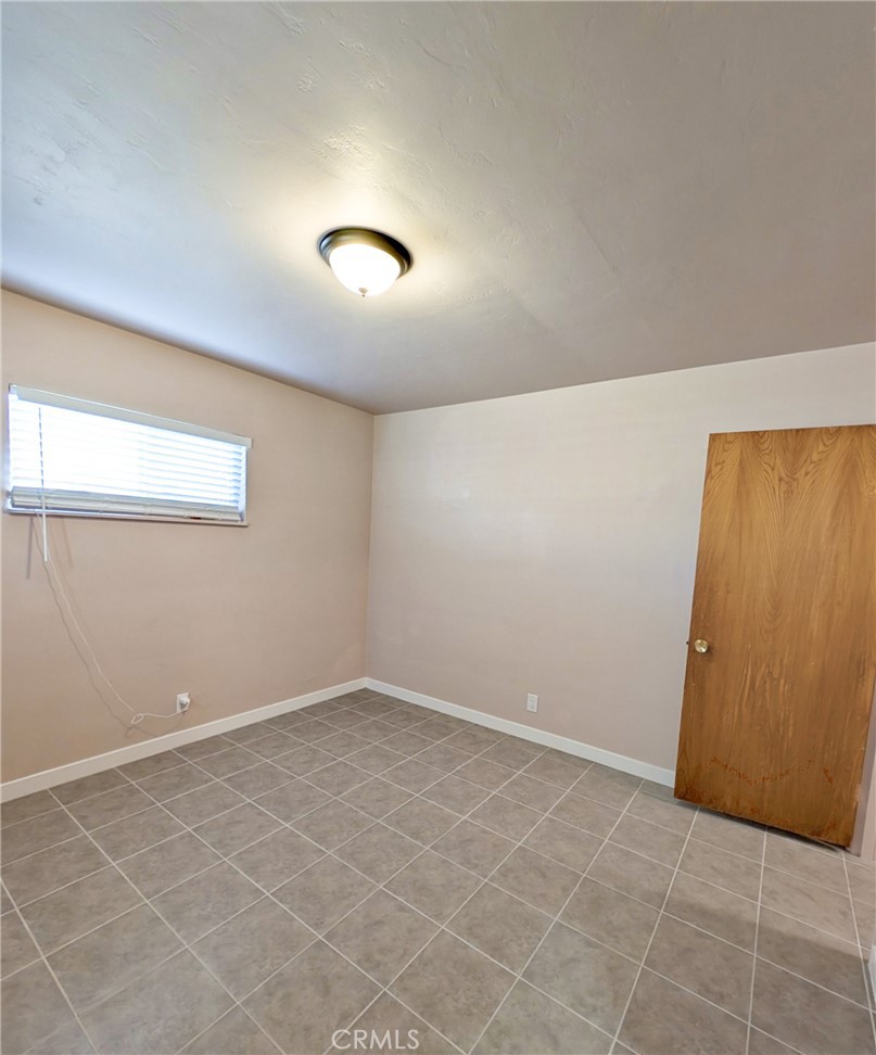 379 North 3rd Street Grover Beach, CA 93433 - Photo 21 of 24 an empty room with windows