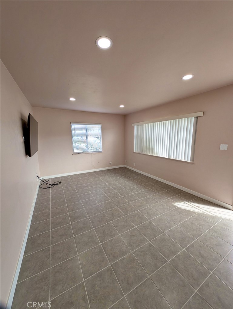 379 North 3rd Street Grover Beach, CA 93433 - Photo 3 of 24 a view of an empty room and a window