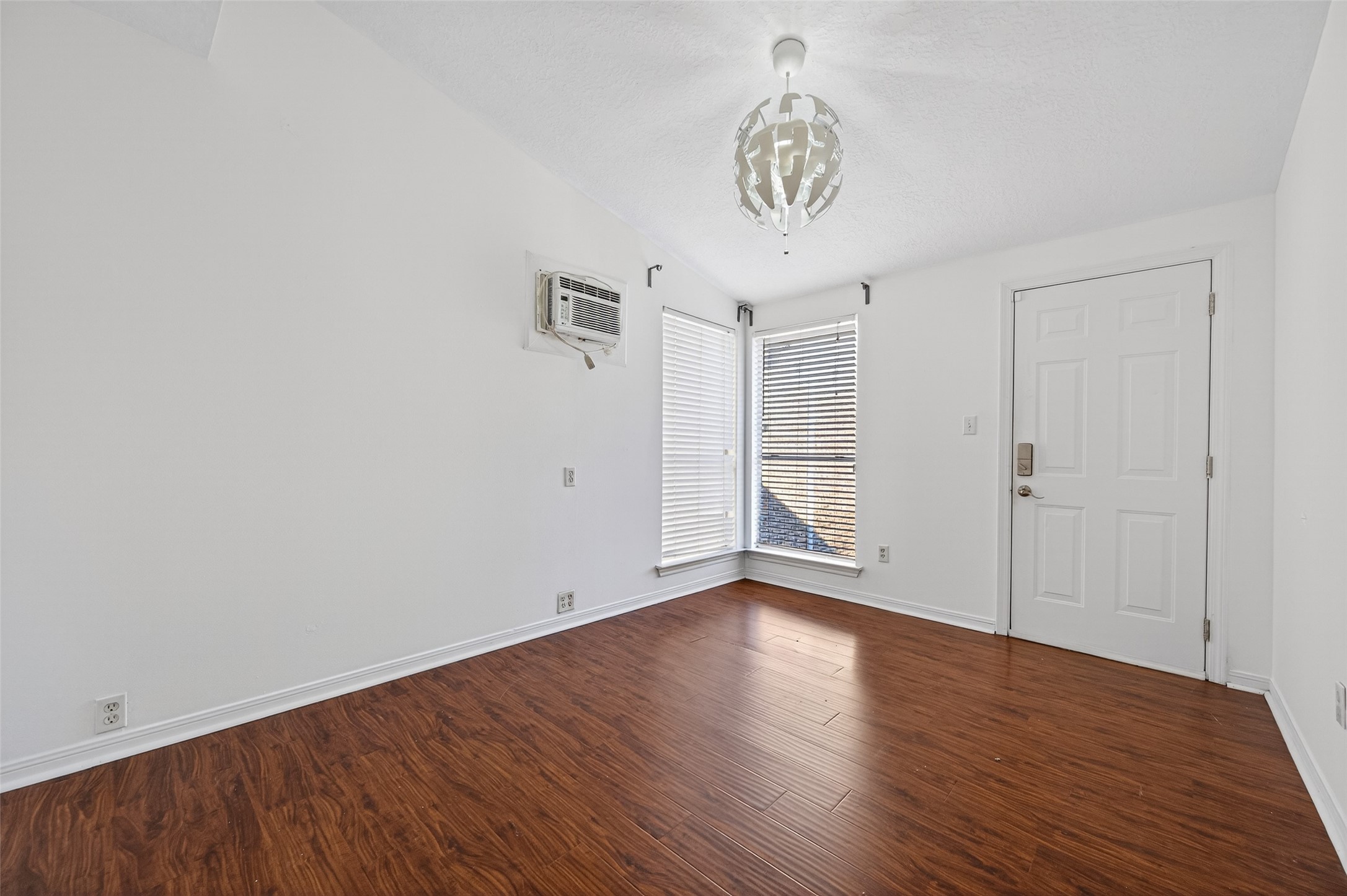 324 West Alabama Street, Unit 1 Houston, TX 77006 - Photo 25 of 30 a view of an empty room with wooden floor